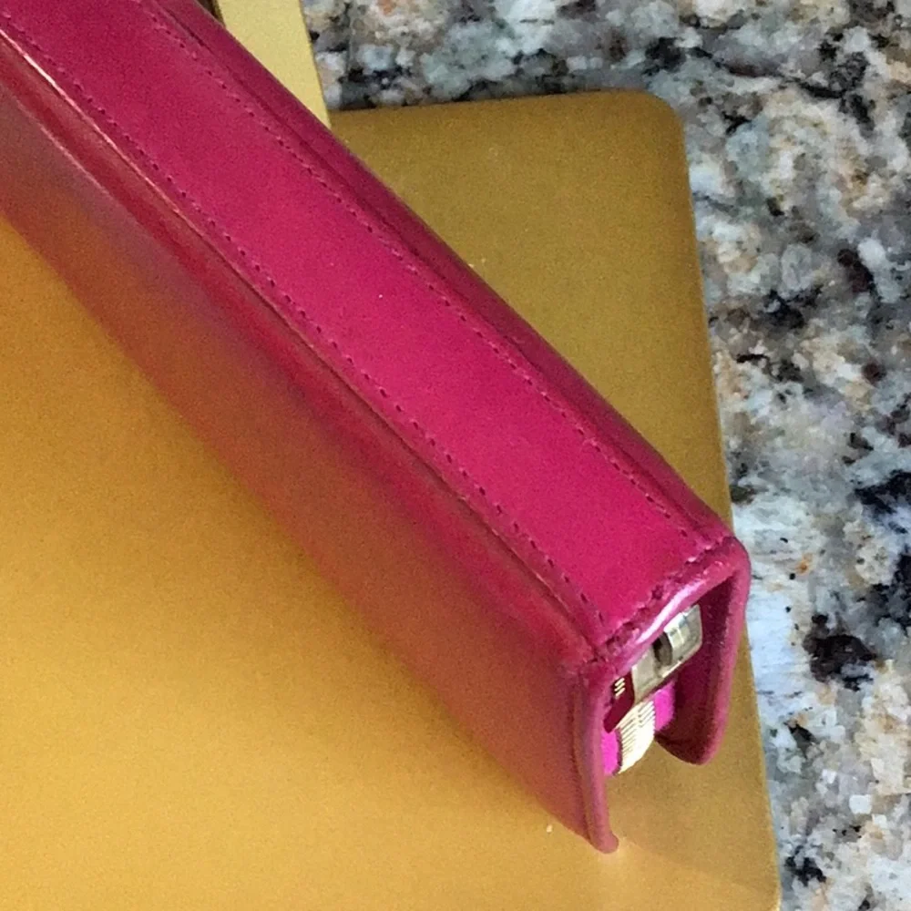 Saint Laurent. pink zippy lambskin wallet gold tone hardware